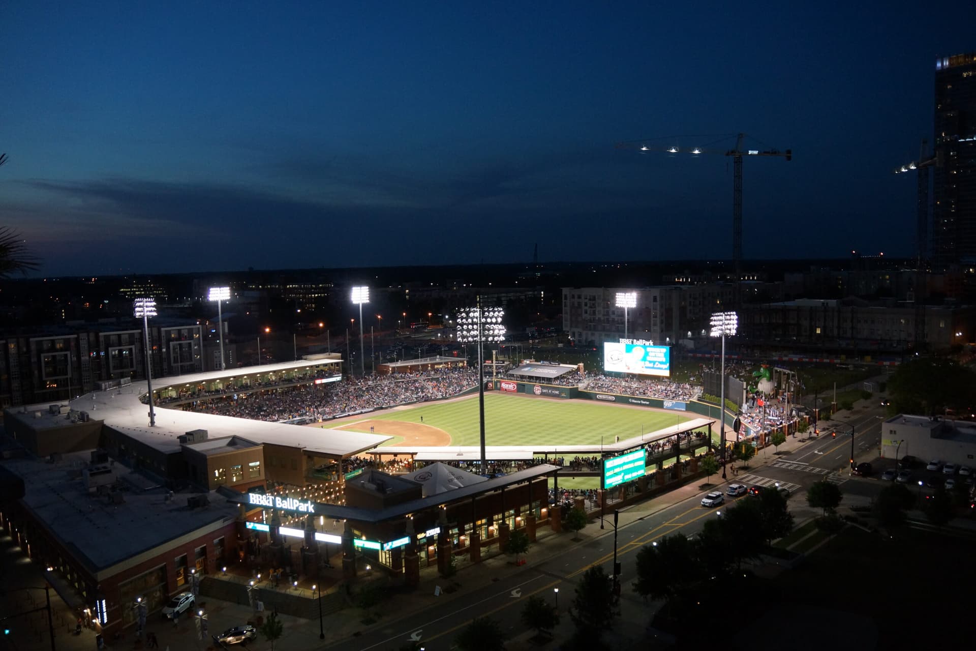 A baseball game in the stadium at night